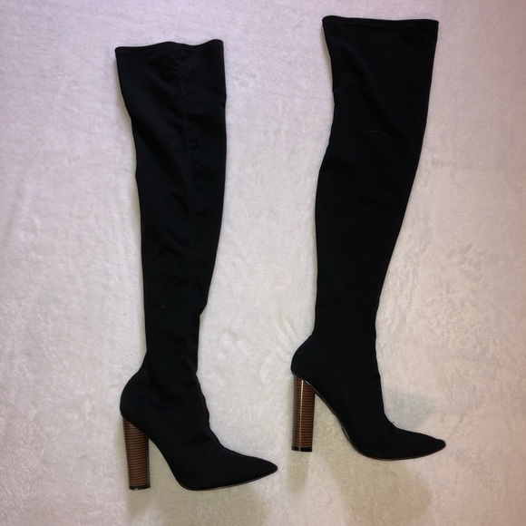 thigh high boots stay up